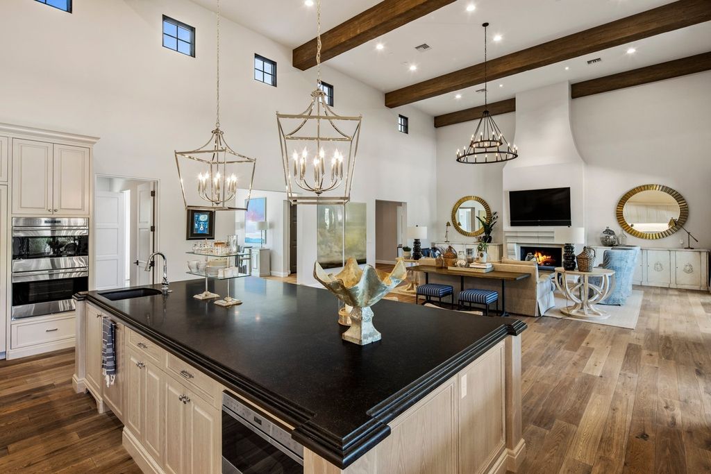 The Home in Scottsdale, a designer masterpiece in prestigious gated community Equestrian Manor with enchanting curb appeal and great attention to detail is now available for sale. This home located at 12028 N 60th Pl, Scottsdale, Arizona