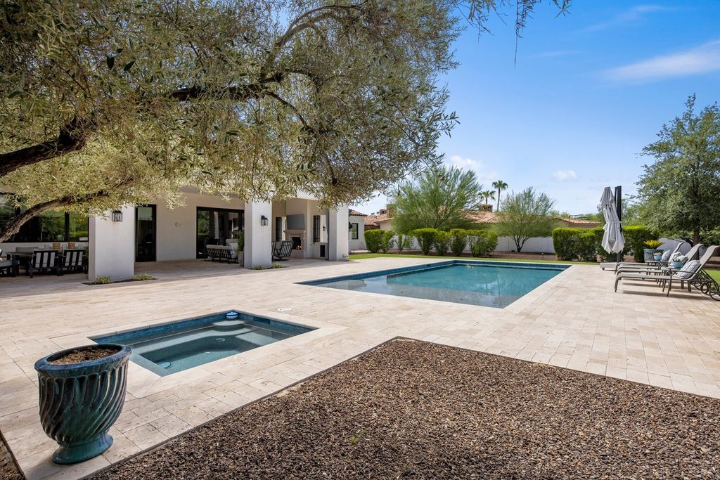 The Home in Scottsdale, a designer masterpiece in prestigious gated community Equestrian Manor with enchanting curb appeal and great attention to detail is now available for sale. This home located at 12028 N 60th Pl, Scottsdale, Arizona