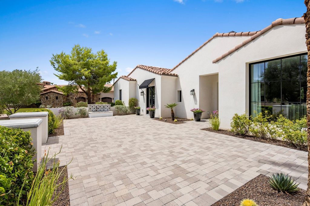 The Home in Scottsdale, a designer masterpiece in prestigious gated community Equestrian Manor with enchanting curb appeal and great attention to detail is now available for sale. This home located at 12028 N 60th Pl, Scottsdale, Arizona