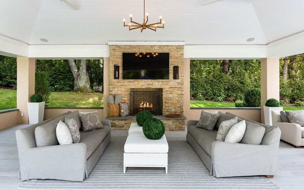 The Home in Greenwich is designed for seamless indoor/outdoor entertaining with resort-style amenities, now available for sale. This home located at 7 Dwight Ln, Greenwich, Connecticut