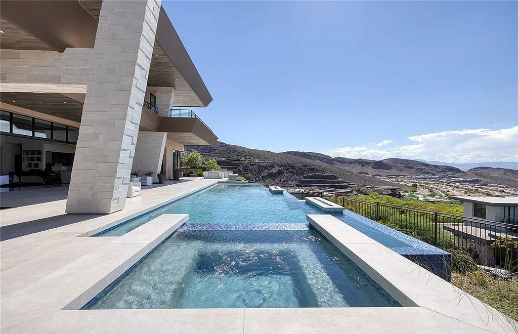 The Home in Henderson, a mesmerizing modern custom Estate in Guard Gated Ascaya designed by Richard Luke offering open indoor-outdoor concept with dramatic architectural lines and gorgeous finishes is now available for sale. This home located at 7 Cloud Chaser Blvd, Henderson, Nevada