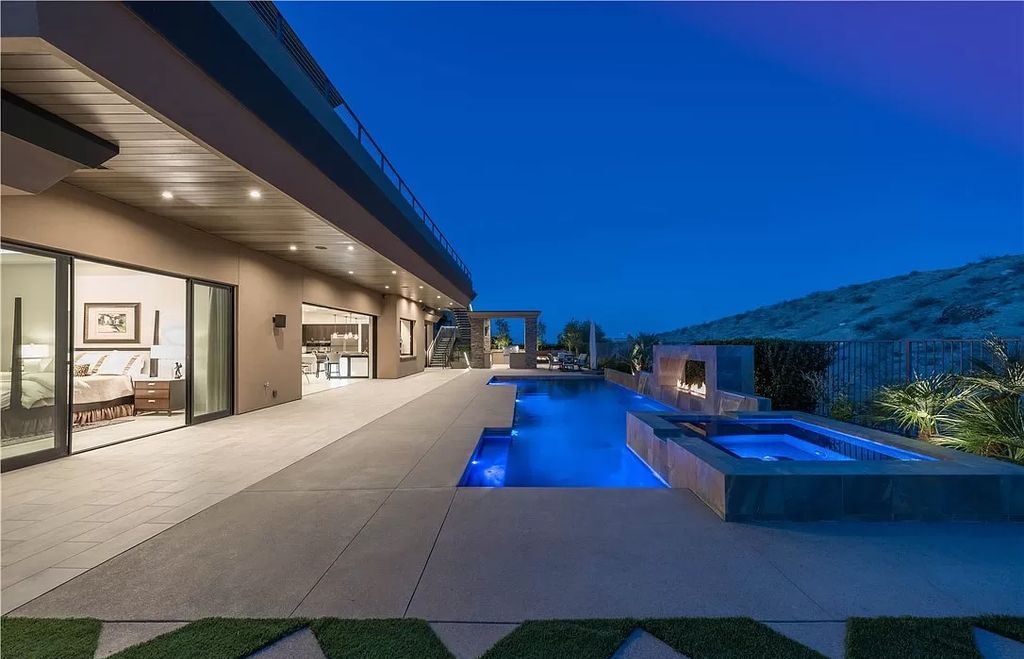 The Home in Henderson, an meticulously crafted masterpiece designed by Richard Luke Architects including a massive formal dining room, a great room communicates seamlessly with the private rear grounds, a solar-heated swimming pool, and more is now available for sale. This home located at 43 Drifting Shadow Way, Las Vegas, Nevada
