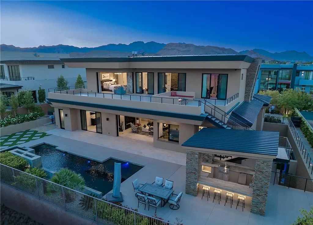 The Home in Henderson, an meticulously crafted masterpiece designed by Richard Luke Architects including a massive formal dining room, a great room communicates seamlessly with the private rear grounds, a solar-heated swimming pool, and more is now available for sale. This home located at 43 Drifting Shadow Way, Las Vegas, Nevada