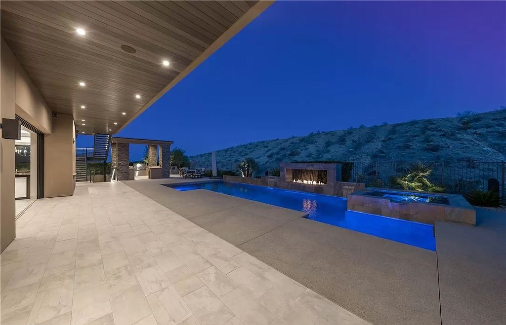 The Home in Henderson, an meticulously crafted masterpiece designed by Richard Luke Architects including a massive formal dining room, a great room communicates seamlessly with the private rear grounds, a solar-heated swimming pool, and more is now available for sale. This home located at 43 Drifting Shadow Way, Las Vegas, Nevada