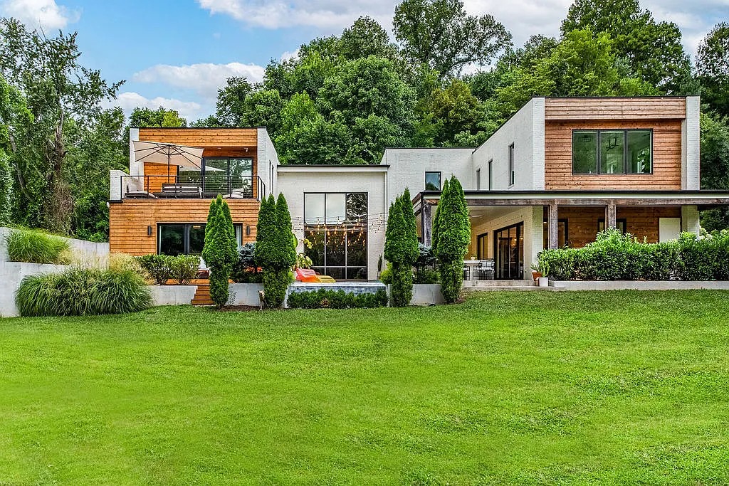 The House in Nashville is equipped with designer finishes and custom features, and surrounds a heated pool and spa, now available for sale. This home located at 2616 Tiffany Dr, Nashville, Tennessee