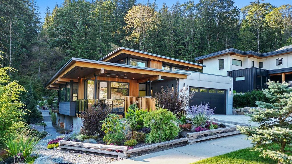 The Home in Squamish offers a backyard for entertaining & play complete with a salt-water pool, in-ground custom hot tub, fire pit, now available for sale. This home located at 38625 High Creek Dr, Squamish, BC V8B 0T6, Canada