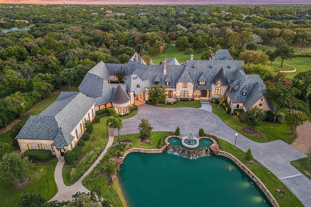 The Estate in Southlake, a true dream home with designer finishes opens to a luxurious living area exudes opulence on over 7 acres featuring a private pond with gorgeous fountains is now available for sale. This home located at 935 W Dove Rd, Southlake, Texas