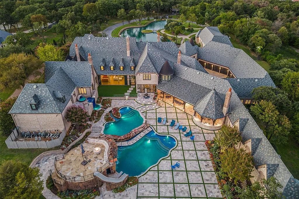 The Estate in Southlake, a true dream home with designer finishes opens to a luxurious living area exudes opulence on over 7 acres featuring a private pond with gorgeous fountains is now available for sale. This home located at 935 W Dove Rd, Southlake, Texas