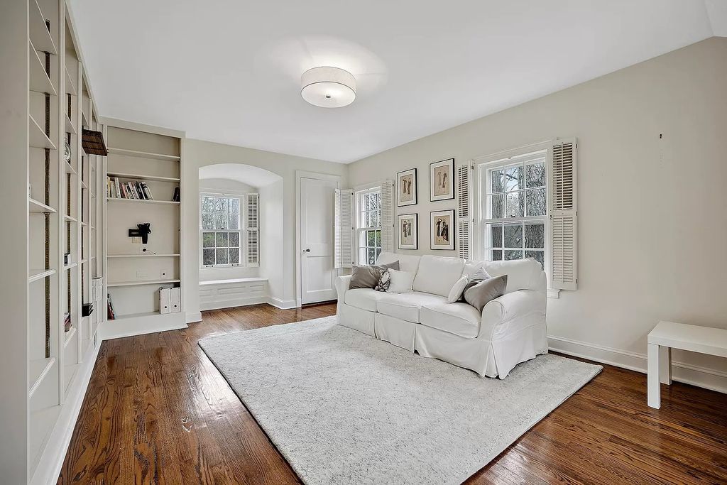 The House in Winnetka offers inviting two-story foyer with curved staircase and marble floors, now available for sale. This home located at 62 Woodley Rd, Winnetka, Illinois