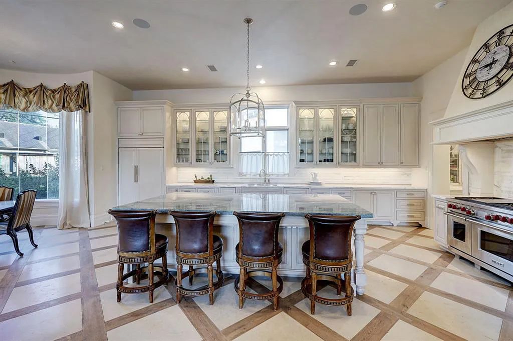 The Houston Home, a stunning property set on an expansive corner lot with sumptuous amenities throughout, high ceilings, French oak and limestone flooring and stunning mill-work is now available for sale. This home located at 5609 Lynbrook Dr, Houston, Texas