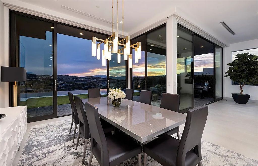 The Home in Henderson, a Five Fairway Villa with strip, golf and mountain views in Exclusive MacDonald Highlands featuring finest finishes and luxurious entertainment amenities is now available for sale. This home located at 491 Serenity Point Dr, Henderson, Nevada