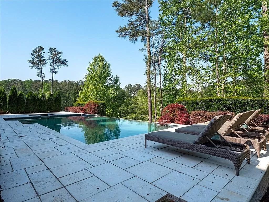 The Estate in Milton is a luxurious home featuring open floor plan and breathtaking outdoor area now available for sale. This home located at 16146 Belford Dr, Milton, Georgia; offering 07 bedrooms and 09 bathrooms with 8,979 square feet of living spaces.