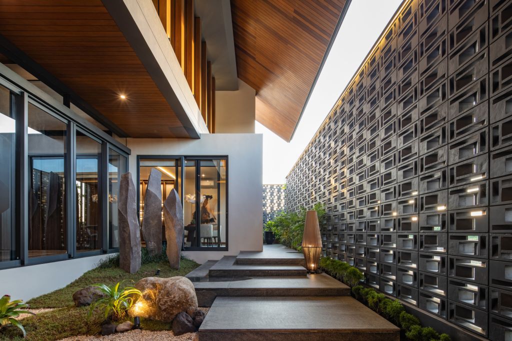The Alia Residence with Modern Tropical Style in Indonesia by Axial Studio