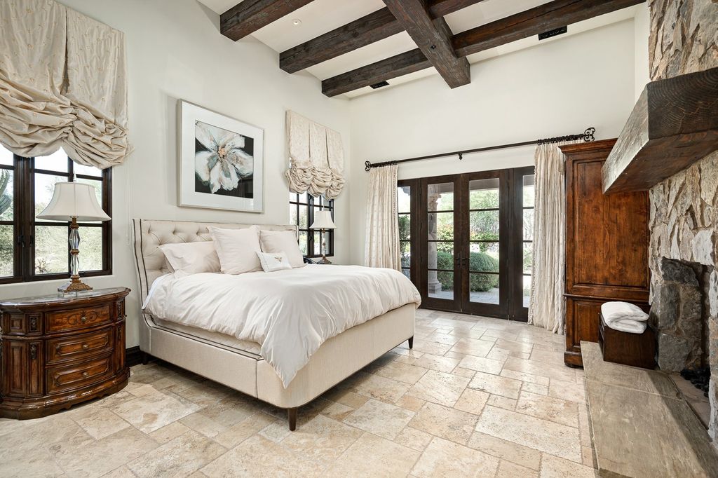 The Home in Scottsdale, an elegant Spanish Colonial Estate with unsurpassed sweeping valley views in the prestigious Upper Canyon neighborhood of Silverleaf offering multiple outdoor living areas is now available for sale. This home located at 11021 E Whistling Wind Way Unit 1801, Scottsdale, Arizona