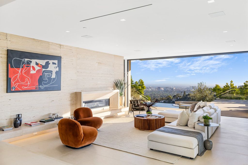 The Mansion in Beverly Hills, a stunning new construction estate features health renewal technology into this Mid-Century inspired modern compound is now available for sale. This home located at 1731 Summitridge Dr, Beverly Hills, California