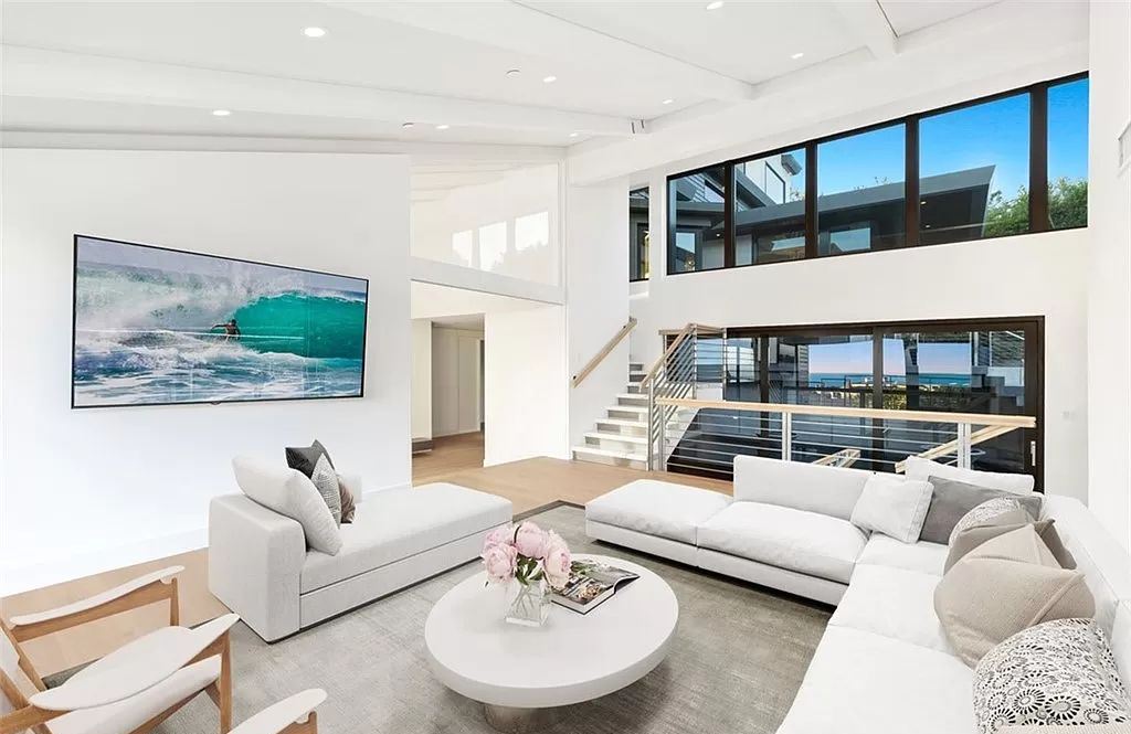 The Estate in Corona Del Mar, a breathtaking ocean and island view home with open layout design offering an unparalleled combination of beachside elegance and modern function is now available for sale. This home located at 4700 Surrey Dr, Corona Del Mar, California