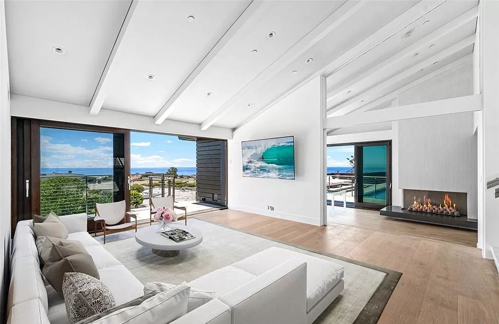 The Estate in Corona Del Mar, a breathtaking ocean and island view home with open layout design offering an unparalleled combination of beachside elegance and modern function is now available for sale. This home located at 4700 Surrey Dr, Corona Del Mar, California