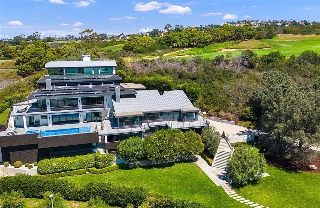 The Estate in Corona Del Mar, a breathtaking ocean and island view home with open layout design offering an unparalleled combination of beachside elegance and modern function is now available for sale. This home located at 4700 Surrey Dr, Corona Del Mar, California