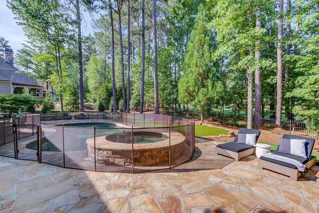 The Estate in Suwanee is a luxurious home which is vastly different from any other estate you've ever known now available for sale. This home located at 4675 Whitestone Way, Suwanee, Georgia; offering 06 bedrooms and 09 bathrooms with 10,743 square feet of living spaces.