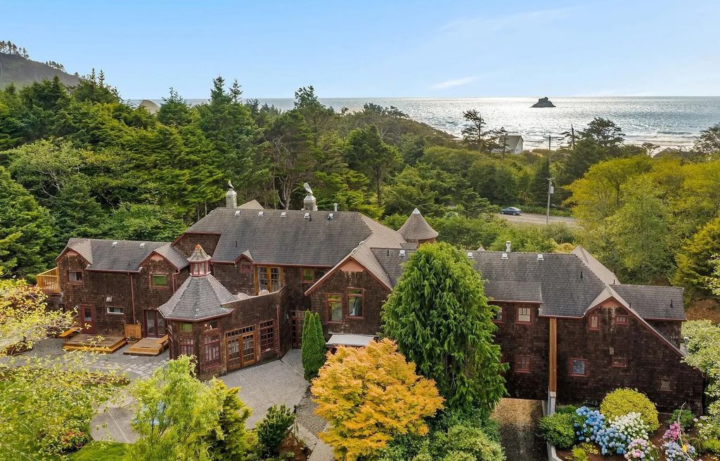 The Estate in Arch Cape is a luxurious home situated on secluded acres adjacent to Sandy Beach and Cannon Beach Fine Dining and Shops now available for sale. This home located at 31970 E Ocean Ln, Arch Cape, Oregon; offering 11 bedrooms and 11 bathrooms with 9,500 square feet of living spaces.