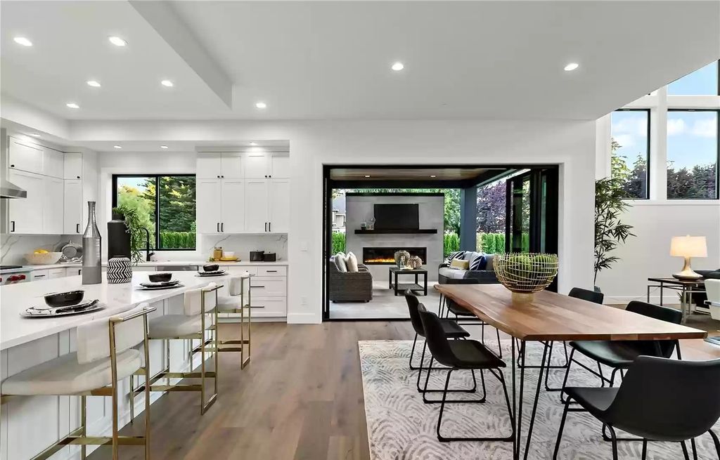 The Home in Bellevue was constructed with the highest quality designer finishes including oak floors and epicureans eat-in kitchen, now available for sale. This home located at 235 140th Avenue NE, Bellevue, Washington