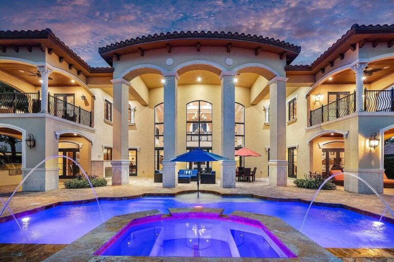 This $5.95 Million Contemporary Mediterranean Villa in Fort Lauderdale has A Vacation Resort Style Pool with Fountain and Optic Lighting