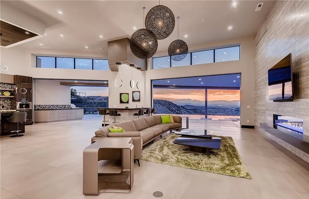 The Home in Henderson, a beautiful estate has a special exclusive view of the famous “Dragon’s Back” in MacDonald Highlands offering a completely comfortable and tranquil atmosphere is now available for sale. This home located at 665 Dragon Peak Dr, Henderson, Nevada