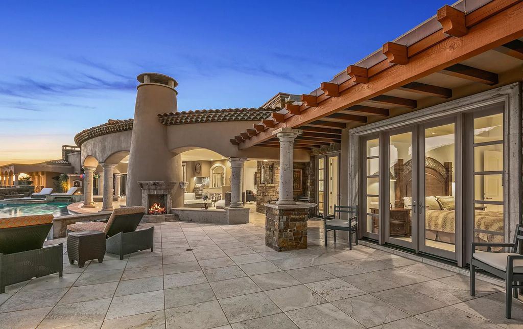 The Home in Scottsdale, a ridgetop masterpiece provides 360-degree breathtaking views of sunrises and sunsets, additional golf fairways and greens, striking mountains and Desert Mountain night lights. is now available for sale. This home located at 9643 E Legacy Ridge Rd, Scottsdale, Arizona