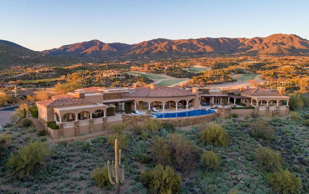The Home in Scottsdale, a ridgetop masterpiece provides 360-degree breathtaking views of sunrises and sunsets, additional golf fairways and greens, striking mountains and Desert Mountain night lights. is now available for sale. This home located at 9643 E Legacy Ridge Rd, Scottsdale, Arizona