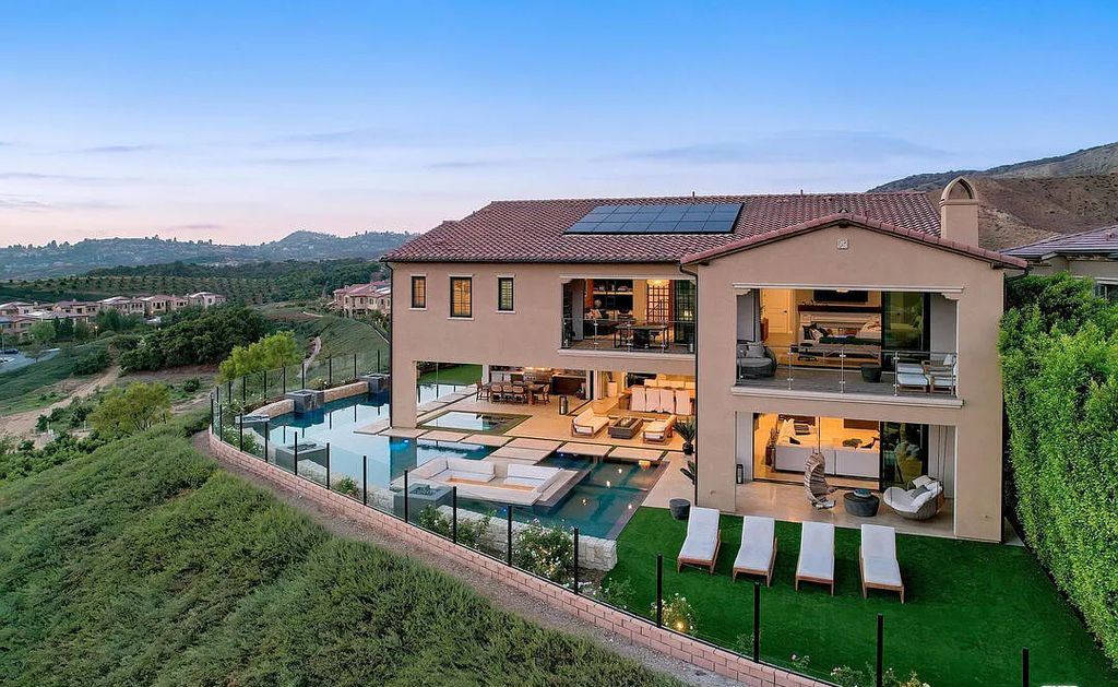 The Home in Irvine, an exceptional estate combines the ultimate in interior finishes and exterior amenities offering incredible panoramic city and canyon views is now available for sale. This home located at 100 Dry Crk, Irvine, California