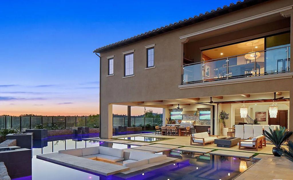 The Home in Irvine, an exceptional estate combines the ultimate in interior finishes and exterior amenities offering incredible panoramic city and canyon views is now available for sale. This home located at 100 Dry Crk, Irvine, California