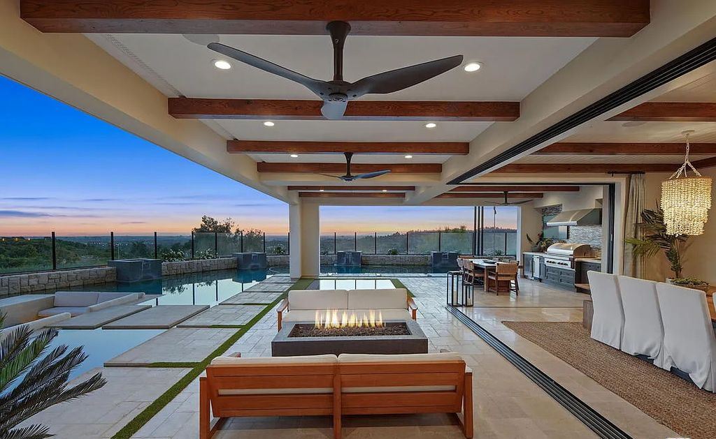 The Home in Irvine, an exceptional estate combines the ultimate in interior finishes and exterior amenities offering incredible panoramic city and canyon views is now available for sale. This home located at 100 Dry Crk, Irvine, California