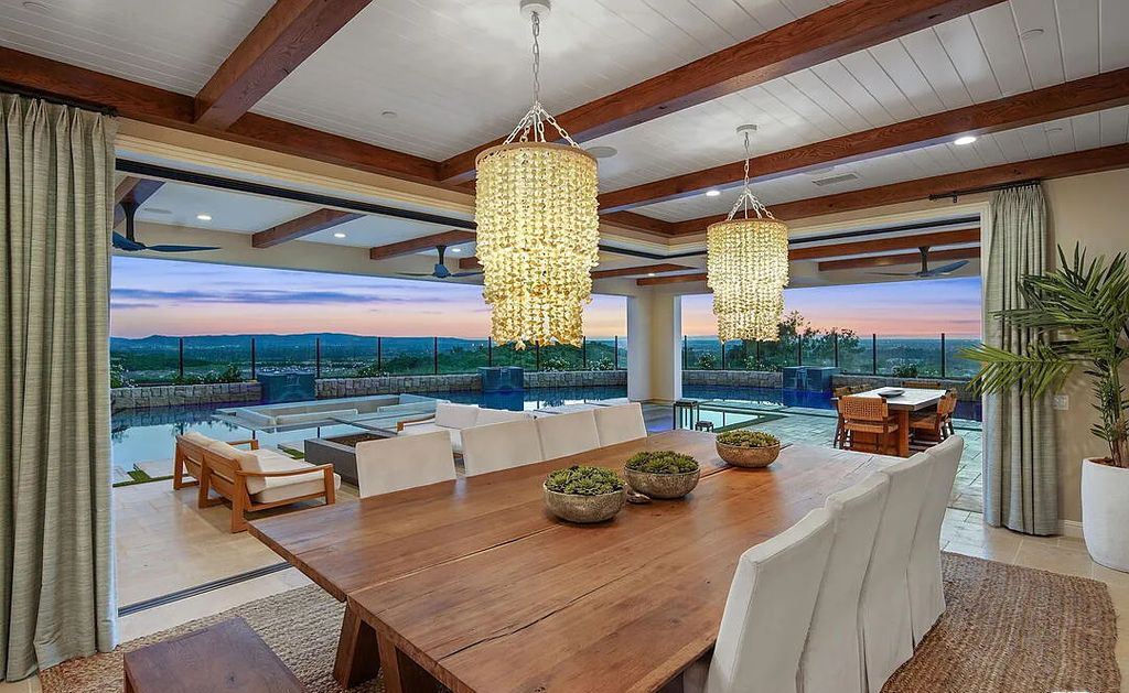 The Home in Irvine, an exceptional estate combines the ultimate in interior finishes and exterior amenities offering incredible panoramic city and canyon views is now available for sale. This home located at 100 Dry Crk, Irvine, California