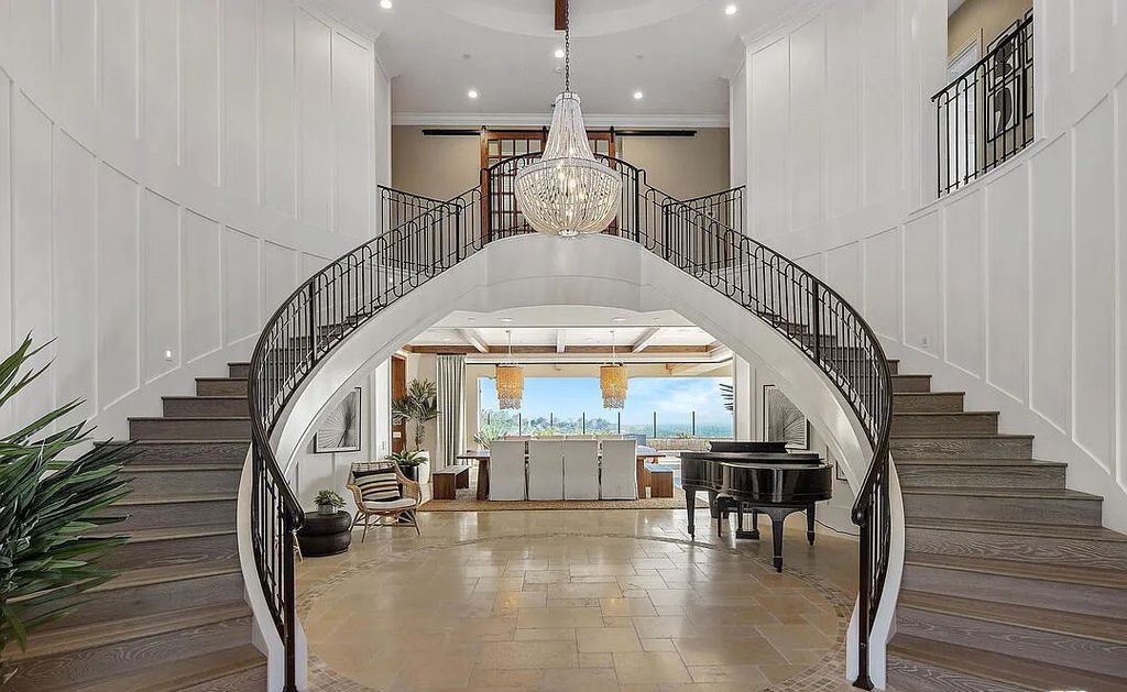 The Home in Irvine, an exceptional estate combines the ultimate in interior finishes and exterior amenities offering incredible panoramic city and canyon views is now available for sale. This home located at 100 Dry Crk, Irvine, California