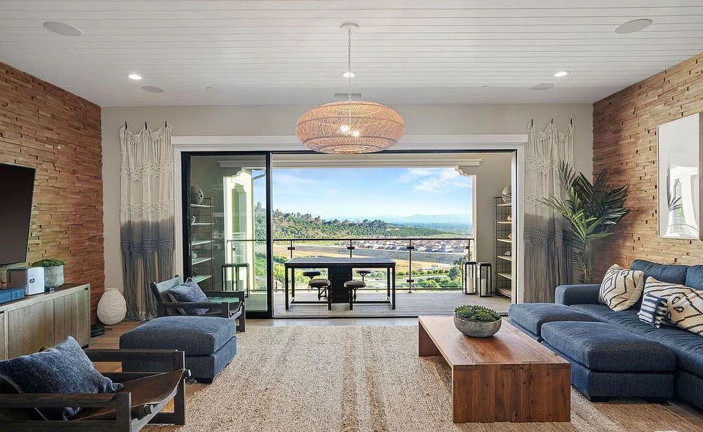 The Home in Irvine, an exceptional estate combines the ultimate in interior finishes and exterior amenities offering incredible panoramic city and canyon views is now available for sale. This home located at 100 Dry Crk, Irvine, California