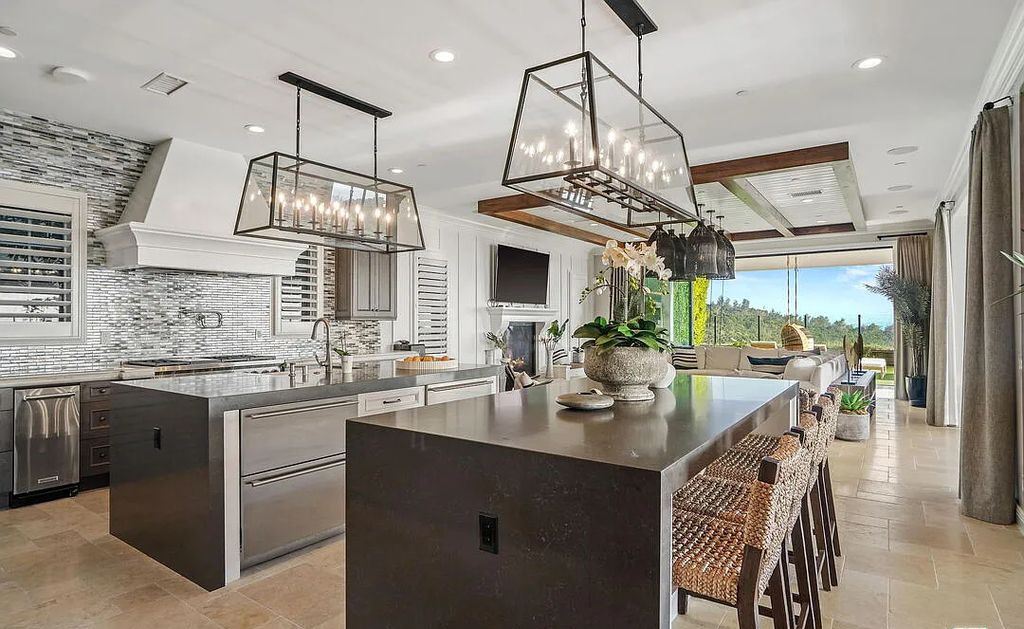 The Home in Irvine, an exceptional estate combines the ultimate in interior finishes and exterior amenities offering incredible panoramic city and canyon views is now available for sale. This home located at 100 Dry Crk, Irvine, California