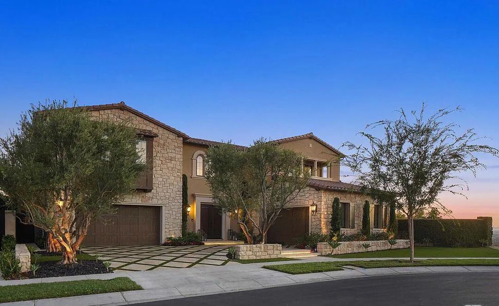 The Home in Irvine, an exceptional estate combines the ultimate in interior finishes and exterior amenities offering incredible panoramic city and canyon views is now available for sale. This home located at 100 Dry Crk, Irvine, California