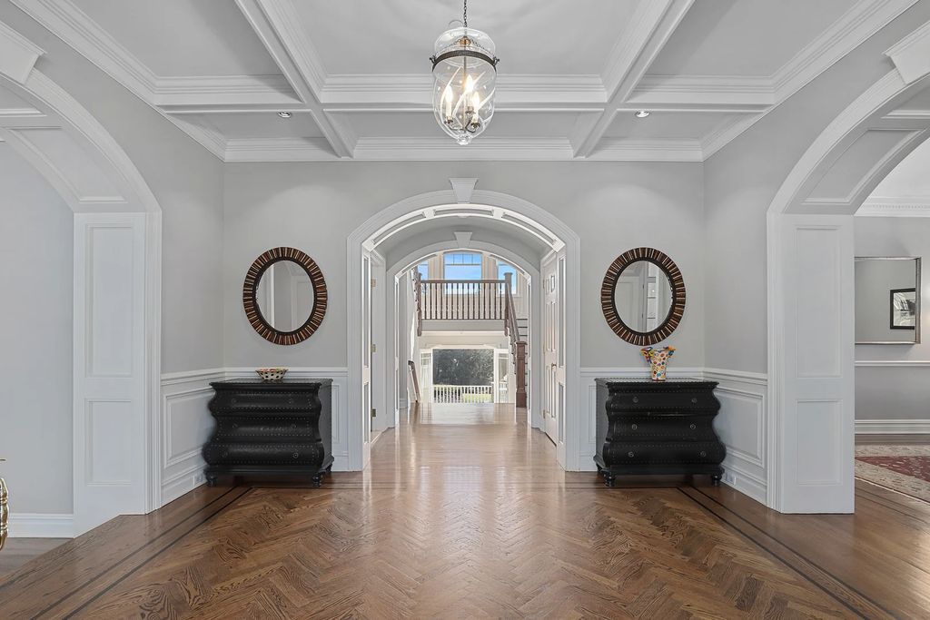 The Home in Purchase, an exceptional property features a gated entrance, manicured lawns, a large pool and hot tub, and an expansive raised patio in an exclusive neighborhood is now available for sale. This home located at 4 Lincoln Lane, Purchase, New York