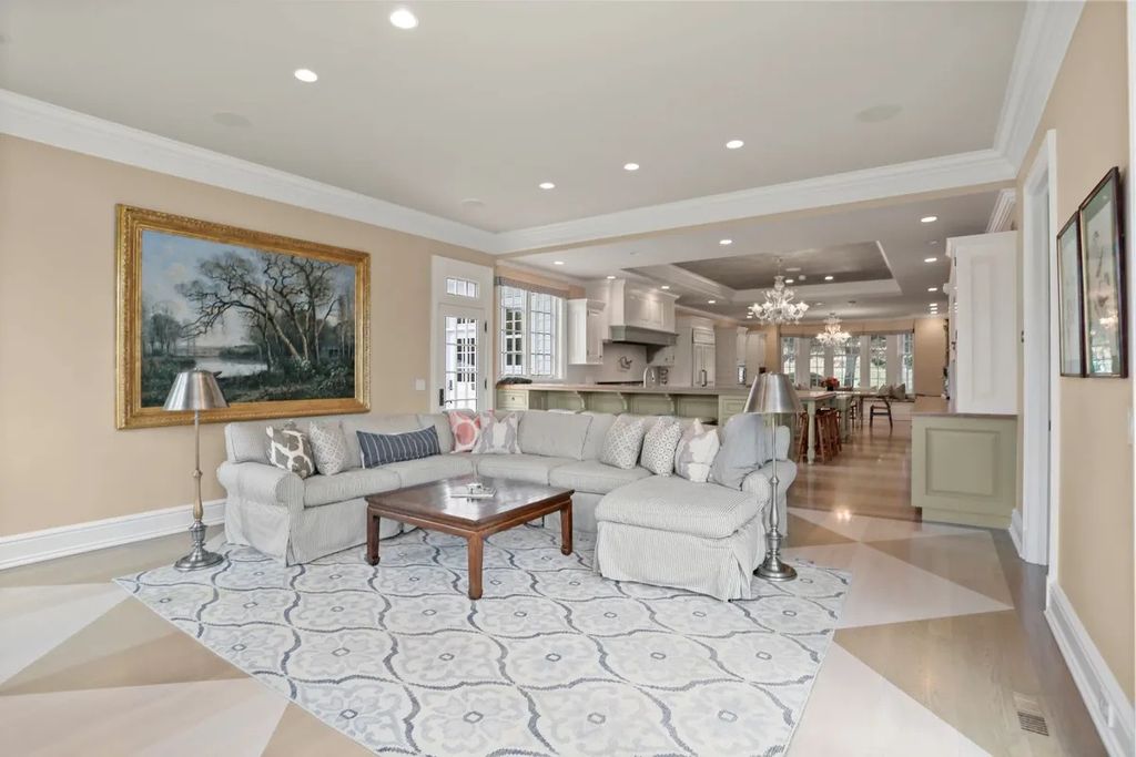 The Manor in Greenwich offers beautiful infinity pool and spa with a pool house, indoor and outdoor showers and outdoor kitchen, now available for sale. This home located at 59 Mooreland Rd, Greenwich, Connecticut