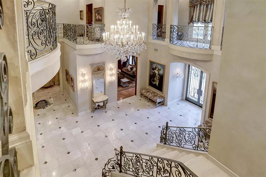 The Mansion in Tomball, a timeless estate with French style and old world charm featuring unique architectural design, attention to detail and the exceptional quality of materials is now available for sale. This home located at 36 Saddlebrook Ct, Tomball, Texas