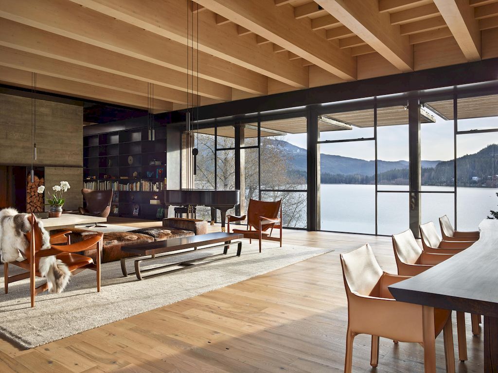 Whistler Ski House in Canada with a glass - walled bridge by Olson Kundig