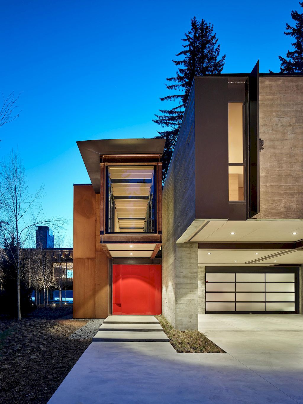 Whistler Ski House in Canada with a glass - walled bridge by Olson Kundig