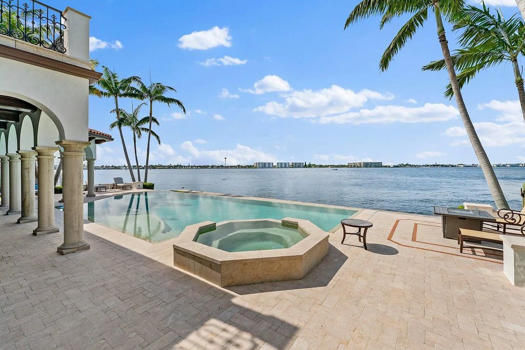 1030 Coral Way, Riviera Beach, Florida is a rare waterfront home boasts 230 feet of water frontage with spectacular panoramic views near restaurants, shopping and ocean.