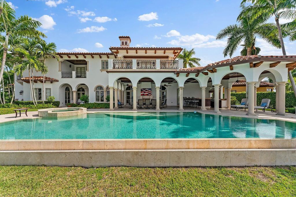 1030 Coral Way, Riviera Beach, Florida is a rare waterfront home boasts 230 feet of water frontage with spectacular panoramic views near restaurants, shopping and ocean.