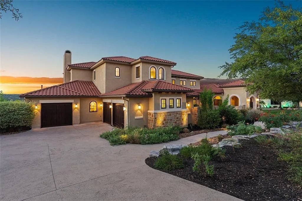 13209 Zen Gardens Way, Austin, Texas is an absolutely stunning home in the heart of Steiner Ranch in the Gated Community with sweeping views of Lake Austin and the hill country.