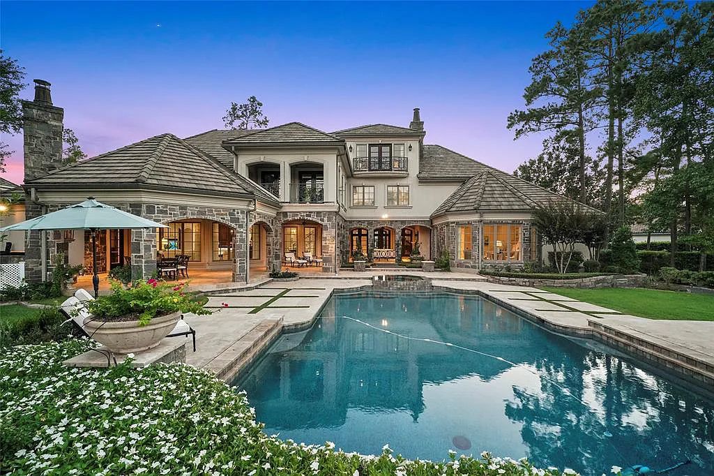 10 Philbrook Way, Spring, Texas is a French inspired magnificent estate on nearly an acre waterfront lot offers elegant outdoor loggias, spectacular pool & fountains, vibrant gardens & serene pond. 800+ bottle climatized sunken wine room.