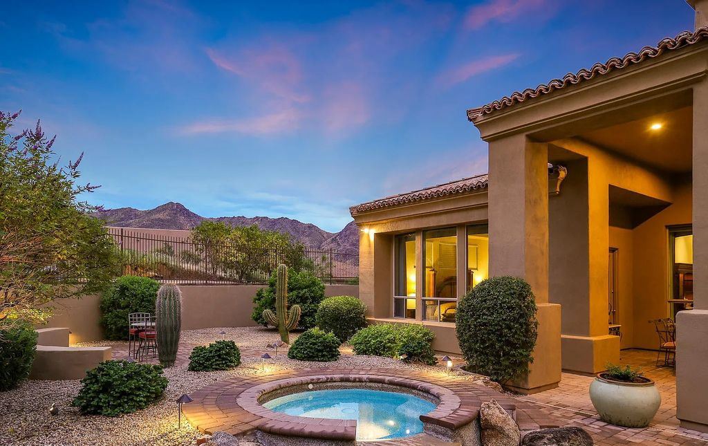 The Home in Scottsdale, a custom estate sitting on 2.78 acres in gated Sonoran Crest with details including box-beam, coffered and groin vault ceiling details, travertine stone flooring, granite counter surfaces, richly stained wood doors, trim, and cabinetry, a split floor plan and so much more is now available for sale. This home located at 24375 N 121st Pl, Scottsdale, Arizona