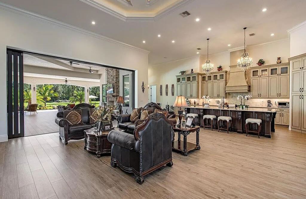 626 17th St SW, Naples, Florida is a exceptional estate with an open floor plan encompasses multiple living areas that flow seamlessly from the indoor space to the outdoor area.