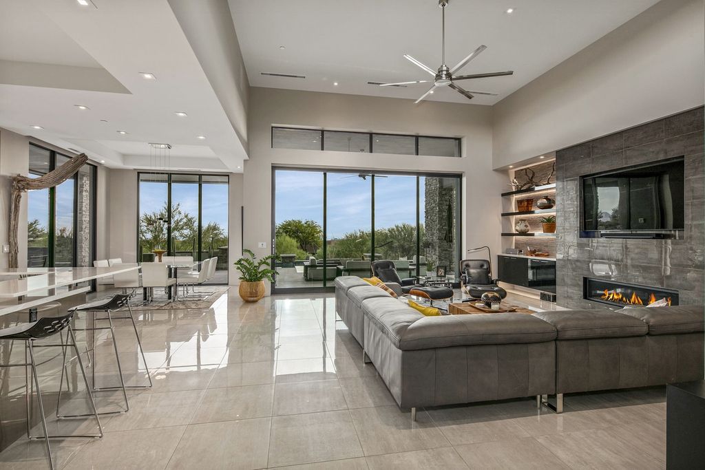 The Home in Scottsdale, a stunning desert contemporary estate which all on one level with open, airy and inviting floor plan encourages the seamless indoor outdoor living experience that is so unique to Arizona  is now available for sale. This home located at 39813 N 103rd Way, Scottsdale, Arizona