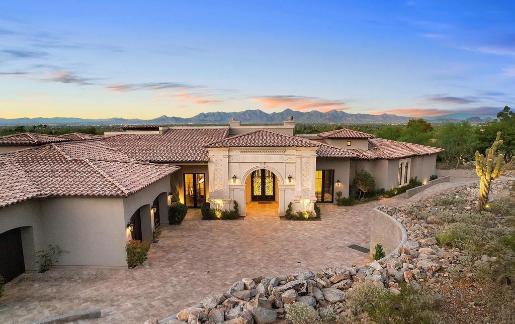 The Estate in Paradise Valley, a phenomenal property has exquisite natural limestone & hardwood flooring throughout, oversized elder wood doors and custom millwork and tile is now available for sale. This home located at 6112 E Quartz Mountain Rd, Paradise Valley, Arizona